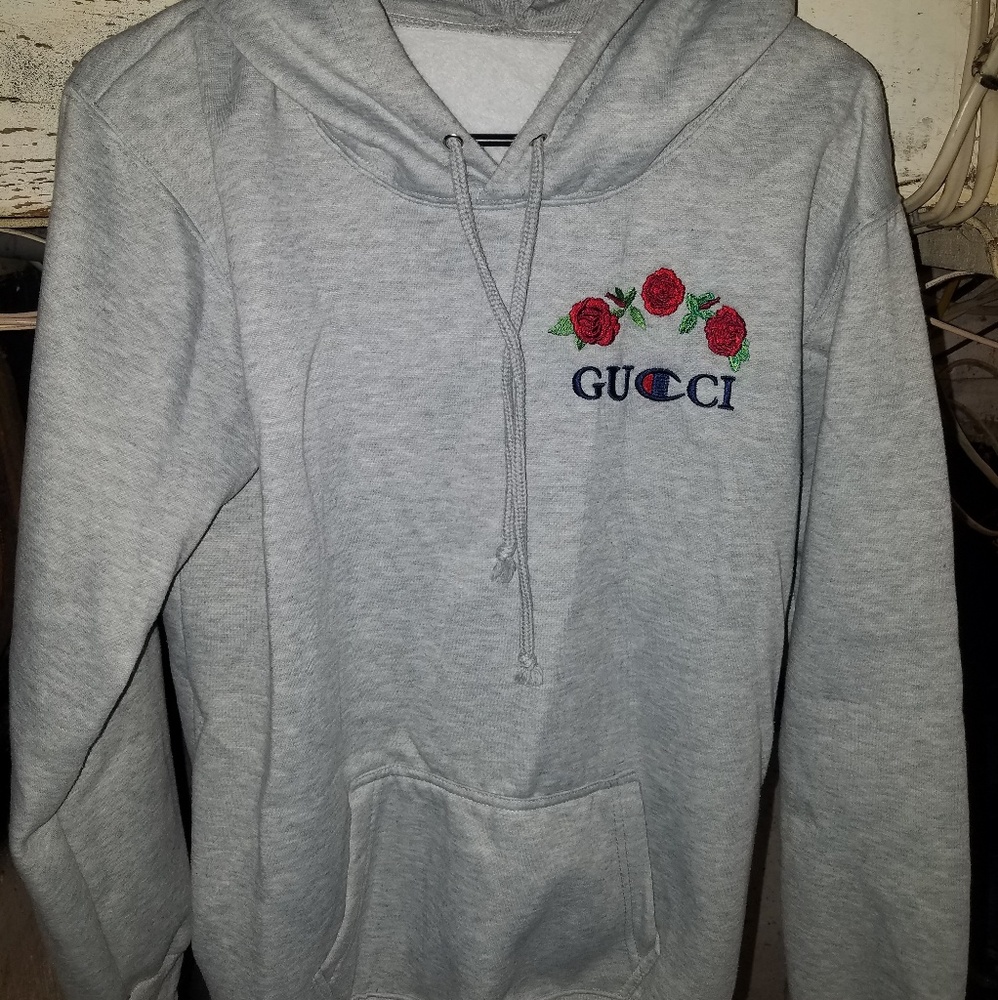Champion: Gucci Sweater
